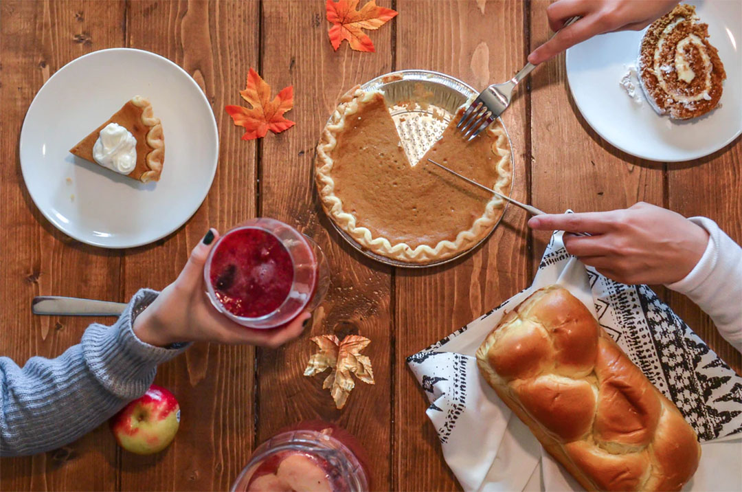 Thanksgiving nutrition tips - table full of Thanksgiving food